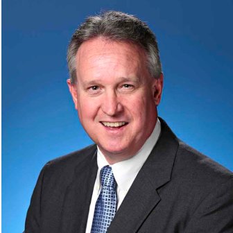 Professional headshot of Bill Finerty, President & CEO of Toyota Material Handling
