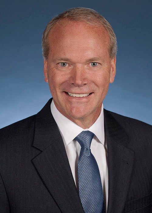 Professional headshot of Brett Wood, President & CEO of Toyota Material Handling North America (TMHNA)