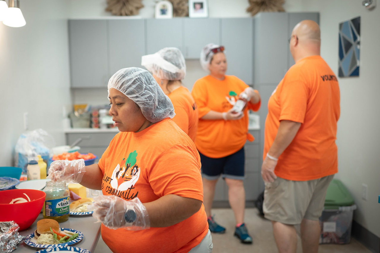 4 tmh employee volunteers at just friends